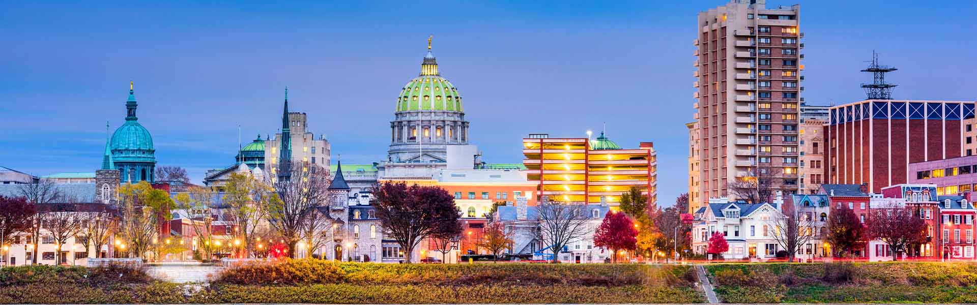 Neon color image of a band playing and people singing along